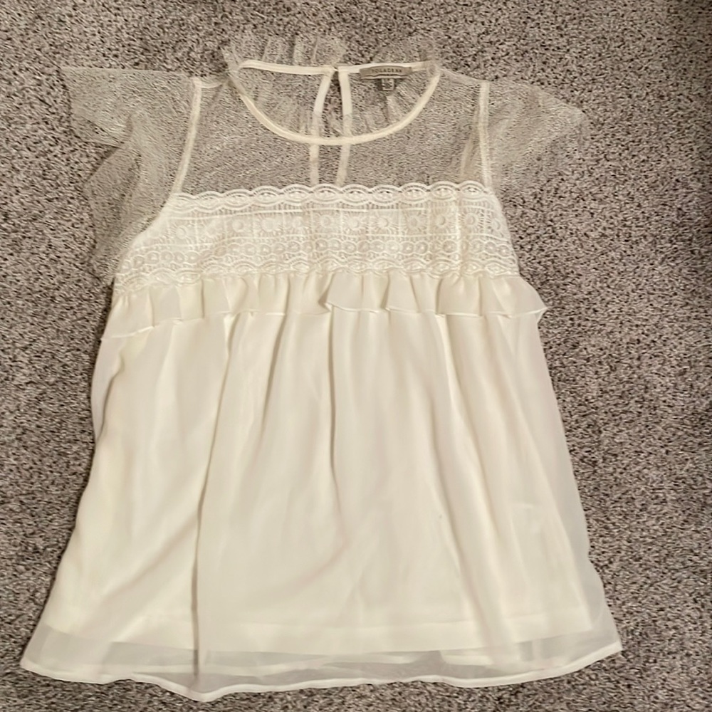 Never-worn cream blouse.